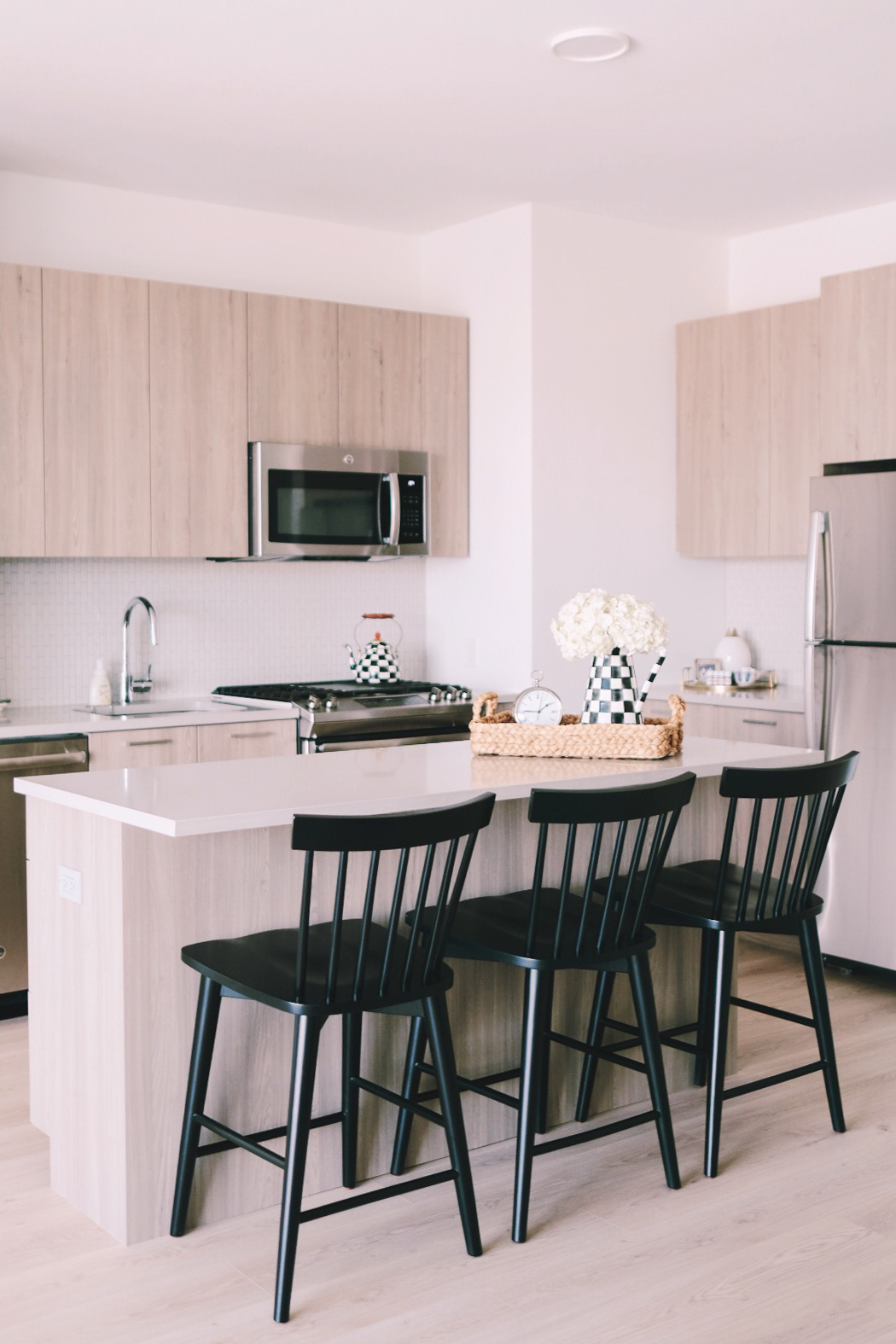 bar stools in apartment kitchen | Miss Madeline Rose